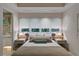 Cozy bedroom with natural light, neutral tones, and a view to the backyard at 229 Alexander Pl, Winter Park, FL 32789