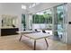 This game room boasts a sleek design and access to a private pool and backyard at 229 Alexander Pl, Winter Park, FL 32789
