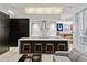 This modern kitchen features a sleek island with seating and lots of cabinet space at 229 Alexander Pl, Winter Park, FL 32789