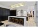 This stylish kitchen is equipped with an island, breakfast bar, and lots of cabinets at 229 Alexander Pl, Winter Park, FL 32789