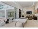 Open floor plan features a recreation area and access to the outdoor living spaces at 229 Alexander Pl, Winter Park, FL 32789