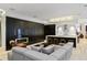 Modern living room featuring a fireplace, breakfast bar, and light hardwood floors at 229 Alexander Pl, Winter Park, FL 32789