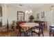Dining room featuring wood floors and traditional decor at 25221 Quail Croft Pl, Leesburg, FL 34748