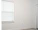 Bright bedroom with a large window and white trim at 2765 Sw 140Th Pl, Ocala, FL 34473