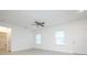 A room with fan, door, and a closet at 2765 Sw 140Th Pl, Ocala, FL 34473