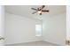 A room with ceiling fan and a window at 2765 Sw 140Th Pl, Ocala, FL 34473
