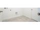 Laundry room features a utility hookup and access door at 2765 Sw 140Th Pl, Ocala, FL 34473
