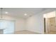 Open-concept living room area with tile flooring, recessed lighting, and a sliding glass door at 2765 Sw 140Th Pl, Ocala, FL 34473