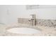 Close-up of bathroom sink with granite countertop and modern faucet at 2765 Sw 140Th Pl, Ocala, FL 34473