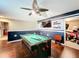 Well-lit game room featuring a pool table, mounted TV, and ceiling fan at 2805 Ponkan Meadow Dr, Apopka, FL 32712