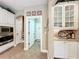 Kitchen space with pantry, stainless steel appliances, and white cabinetry at 2805 Ponkan Meadow Dr, Apopka, FL 32712