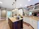 Spacious kitchen with a center island, granite countertops, and recessed lighting at 2805 Ponkan Meadow Dr, Apopka, FL 32712