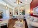 Spacious living room with hardwood floors, elegant furniture, and plenty of natural light at 2805 Ponkan Meadow Dr, Apopka, FL 32712
