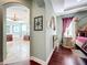 View into the main bedroom and bath showcasing tray ceilings, a decorative fan, and a large walk in closet at 2805 Ponkan Meadow Dr, Apopka, FL 32712