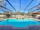 A refreshing screened-in pool with a spa and plenty of room for outdoor enjoyment at 2805 Ponkan Meadow Dr, Apopka, FL 32712