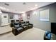 Home theater featuring reclining seats, a large screen, and recessed lighting at 2805 Ponkan Meadow Dr, Apopka, FL 32712