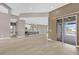 Open living space featuring a view of kitchen, recessed lighting, and sliding glass doors at 2819 Boating Blvd, Kissimmee, FL 34746
