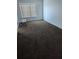 Cozy bedroom featuring comfortable carpeting and natural light at 2836 Club Cortile Cir, Kissimmee, FL 34746