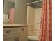Bathroom featuring tiled shower and tub combination with modern vanity at 3651 N Goldenrod Rd # 210, Winter Park, FL 32792
