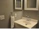 Cozy bathroom featuring a sink with chrome fixtures and mirrored medicine cabinet at 3651 N Goldenrod Rd # 210, Winter Park, FL 32792