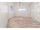 Bright carpeted bedroom with natural light from a window at 3967 Campfire Way, Casselberry, FL 32707