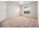 This bedroom features a ceiling fan and neutral carpet at 3967 Campfire Way, Casselberry, FL 32707