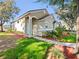 Attractive home with a manicured lawn, fresh mulch, and a clean walkway leading to the inviting front entrance at 3967 Campfire Way, Casselberry, FL 32707
