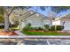 Inviting home with a well-maintained lawn and tasteful landscaping, offering curb appeal and a welcoming atmosphere at 3967 Campfire Way, Casselberry, FL 32707