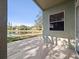 A view from a patio overlooking a serene lake at 3967 Campfire Way, Casselberry, FL 32707
