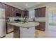 Beautiful kitchen with stainless steel appliances, granite counters, and a center island at 410 South Hudson St, Orlando, FL 32835