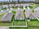 Aerial view of the home showing a fenced backyard, landscaping, and community at 432 Tallow Wood Cir, Debary, FL 32713