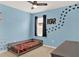 The bedroom features playful decor, themed accents, and ample space at 432 Tallow Wood Cir, Debary, FL 32713