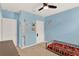 The bedroom features playful decor, themed accents, and ample space at 432 Tallow Wood Cir, Debary, FL 32713