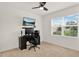 Bedroom with carpet, desk setup, and natural light through the window at 432 Tallow Wood Cir, Debary, FL 32713