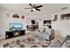 Open-concept living space with a view to the dining area and modern decor at 432 Tallow Wood Cir, Debary, FL 32713