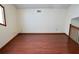 Bedroom with laminate floors and a window provides natural light at 4516 Summergrove Ave, Orlando, FL 32812