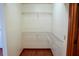 Walk-in closet with wire shelves and ample storage space at 4516 Summergrove Ave, Orlando, FL 32812