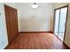 Dining room with laminate floors, closet, and sliding glass door at 4516 Summergrove Ave, Orlando, FL 32812