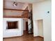 Open-concept living area with spiral staircase and great natural light at 4516 Summergrove Ave, Orlando, FL 32812