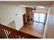 Spacious living room featuring a brick fireplace, hardwood floors, and skylights at 4516 Summergrove Ave, Orlando, FL 32812