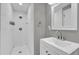 Bright bathroom with a tiled shower, modern vanity, and sleek fixtures at 4521 Jim Glenn Dr, Orlando, FL 32808