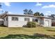 Inviting single Gathering home with a well-manicured lawn and shade trees at 4521 Jim Glenn Dr, Orlando, FL 32808