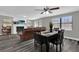 Open-concept layout showcasing the living room fireplace and modern flooring at 4521 Jim Glenn Dr, Orlando, FL 32808