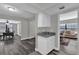 An open-concept living space with luxury vinyl plank flooring at 4521 Jim Glenn Dr, Orlando, FL 32808