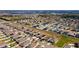High aerial shot of a residential area featuring houses with solar panel roofing at 455 Eaglecrest Dr, Haines City, FL 33844