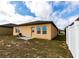 Backyard featuring patio space and grill at 455 Eaglecrest Dr, Haines City, FL 33844