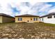Backyard featuring patio space and grill at 455 Eaglecrest Dr, Haines City, FL 33844