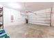 Spacious two-car garage providing ample storage and parking space at 455 Eaglecrest Dr, Haines City, FL 33844