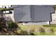 Aerial view of a home showcasing a well manicured lawn and ample parking spaces at 5323 Alcom Dr, Orlando, FL 32812