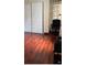 Bright bedroom with hardwood floors, large closet and light filtering curtains at 5323 Alcom Dr, Orlando, FL 32812